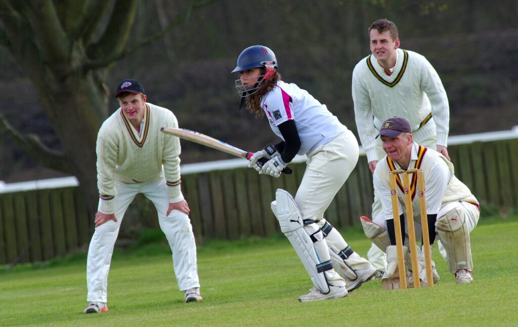 People Playing Cricket